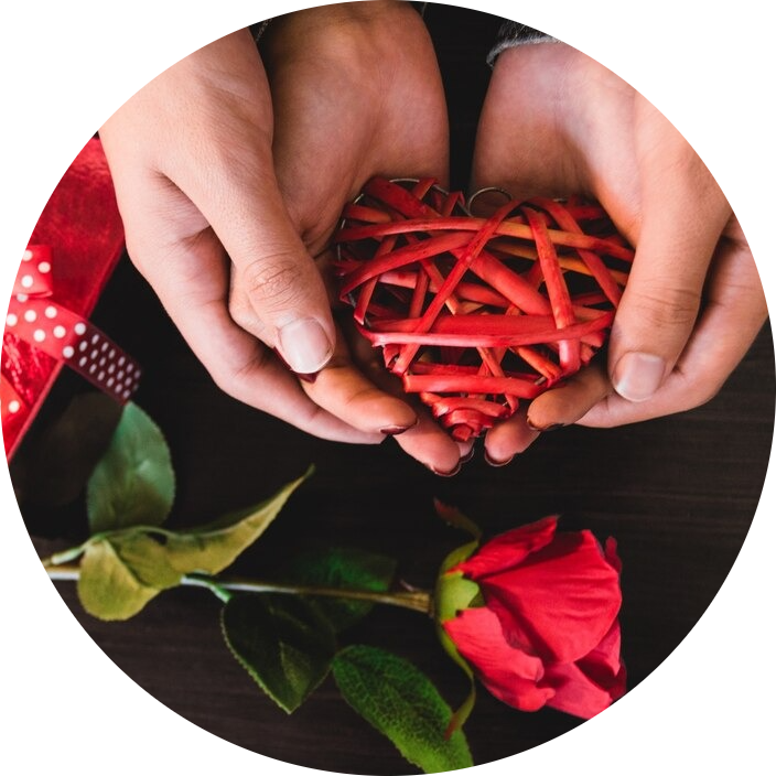 Halloween pumpkin decorations and cupcakes on a table.